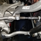 Toyota Supra double-joint spring strut front suspension as viewed from the front